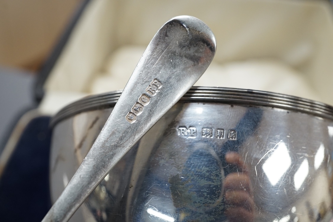 A George III silver octagonal nutmeg grater by Phipps & Robinson, London, 1810, 46mm(a.f.), together with a George III silver pedestal pepperette, by Alice & George Burroughs, London, 1808, 70mm.